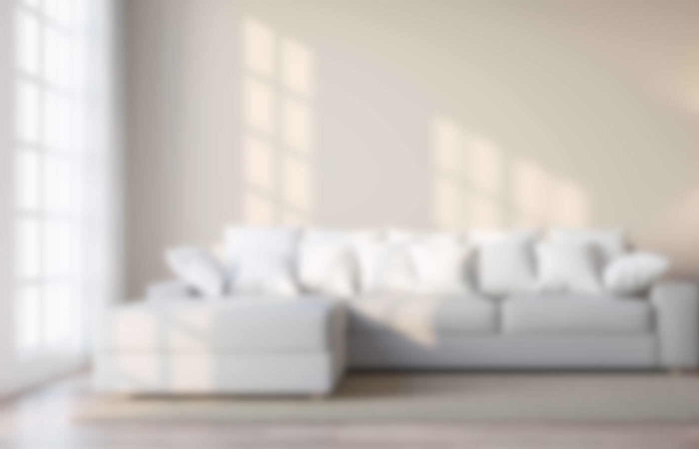 A blurred image of a living room with electric underfloor heating.